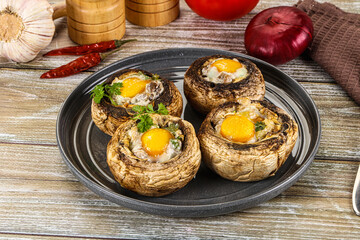 Baked champignon with quail egg