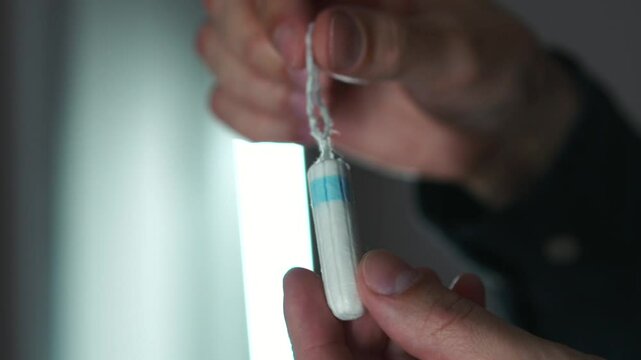 Hygiene products during menstruation.
Abdominal pain during menstruation.
Menstrual cycle.
Tampon close-up