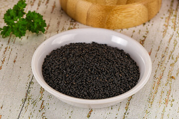 Black dry Nigella seeds in the bowl