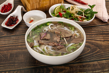 Vietnamese Pho Bo soup with beef and noodles