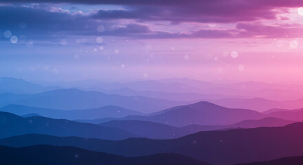 Fototapeta premium Layered mountain ranges with colorful sky background