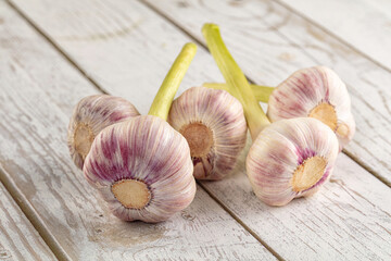 Raw young garlic bulb heap