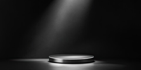 Empty, metallic podium under spotlight