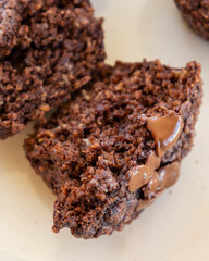  chocolate banana muffins on light background