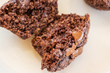  chocolate banana muffins on light background