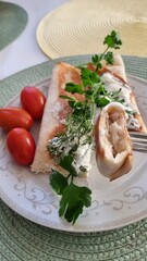 breakfast nice pancakes and cherry tomatoes and herbs and cream 