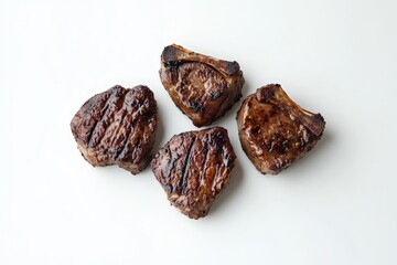 Deliciously grilled steaks presented isolated on a white surface