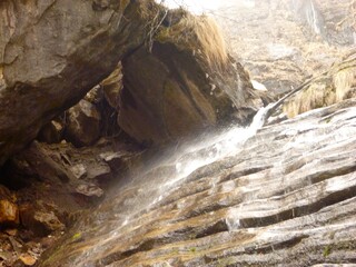 High-altitude waterfall in Nepal in spring