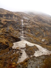 High-altitude waterfall in Nepal in spring