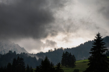 cloudy  mountain landscape inside Val di Fassa, Dolomites, Italy