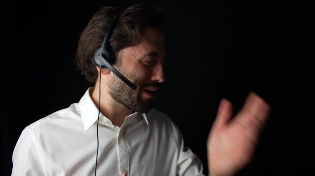 Call center operator wearing a headset, speaking to a customer with a focused and attentive expression.