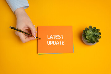 Notes with inscription Latest Update. Updating the version of software components program. New data...