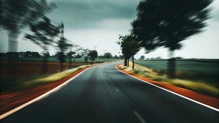 idyllic-view-of-winding-road-amongst-agricultural- (9)