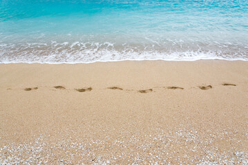 Footprint on a sand beach