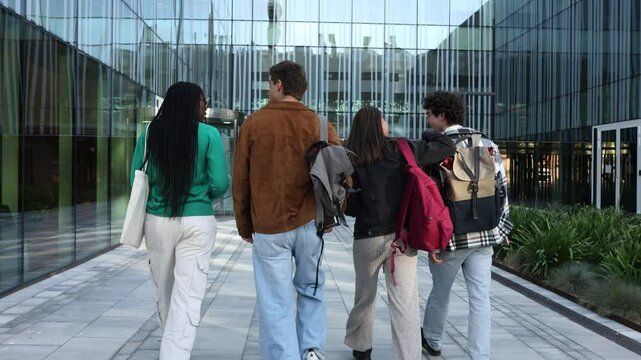 Students walking away from modern building