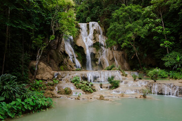 Enjoy the stunning Kuang Si Waterfall in Luang Prabang on a sunny afternoon