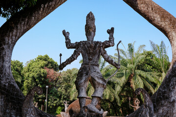 Exploring Buddha Park in Vientiane Laos with stunning sculptures and lush surroundings