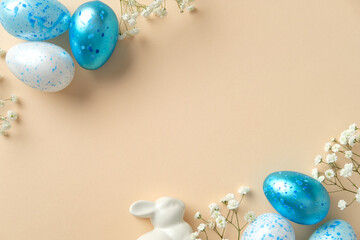 Easter holiday celebration concept. Flat lay composition with blue and white speckled eggs, white...