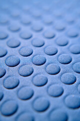 Superficie textil con patrón de circulos en relieve