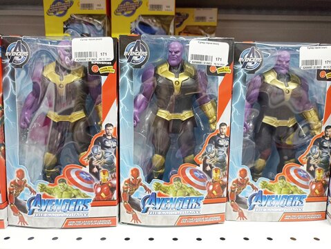 Avengers action figures displayed on store shelf featuring thanos