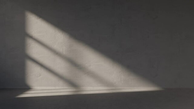 Empty concrete room with window light motion from sunrise. building gray wall in apartment with sunlight shadow. Industrial office space showroom. Abstract architecture background.