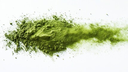 Vibrant matcha powder artfully scattered across a pristine white surface creating a textured organic pattern with a minimalist aesthetic and bright natural light