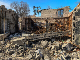 destroyed and burned houses in the city in Ukraine