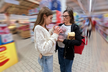 Mother and daughter in a supermarket