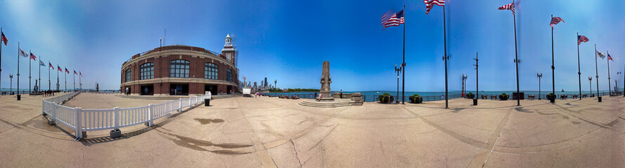 Chicago, IL - July 26, 2024: Tourists and locals relax at Navy Pier on a beautiful summer day. Panoramic view