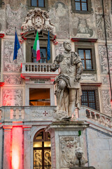 Obraz premium Palazzo della Carovana in Knights Square Pisa, Italy, Illuminated at Nighttime