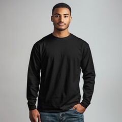 A young man wearing a long sleeved black shirt