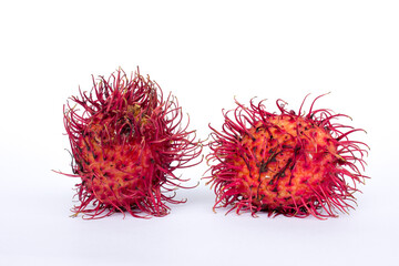 Rambutan fruit isolated on white background. Rambutan is a tropical fruit native to Southeast Asia, particularly Indonesia. It is recognized for its distinctive appearance and sweet, juicy flesh.