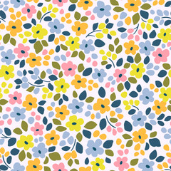 Vector seamless pattern. Easter pattern in small flowers. Small light pink, yellow and blue flowers. White background. Ditsy floral background. Spring template for fashion prints.