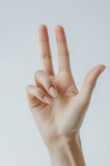 Naklejka premium female hand showing hi sign background photo