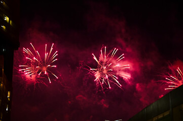 Stunning and colorful fireworks display in the night sky. Real fireworks background. Abstract of...