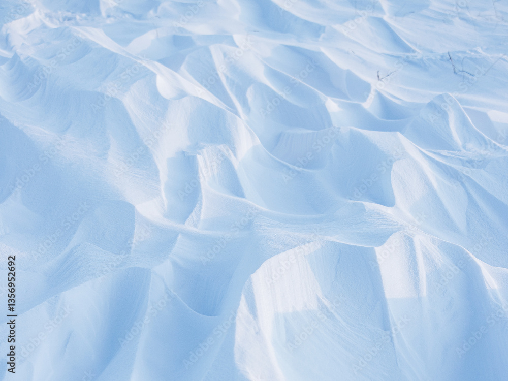 Sticker snow texture. wind sculpted patterns on snow surface. wind in the tundra and in the mountains on the