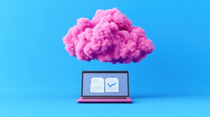 Creative workspace concept with a pink cloud over a laptop, symbolizing data storage and innovation in technology, featuring bright colors and a modern design
