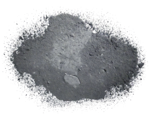 A dramatic closeup of dark gray powder, scattered against a stark white background.  The texture is rough and granular, evoking themes of industry, decay, or the raw elements.