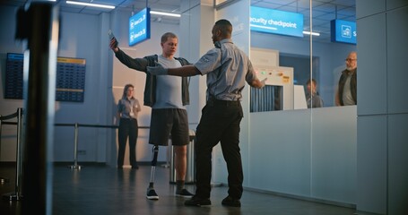 Security Checkpoint in Airport Terminal: African American Security Officer Inspecting Young Man...