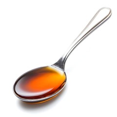 Maple syrup in a metal spoon