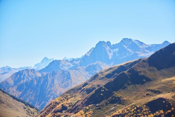 Fototapeta premium Mountain landscape. Autumn colors of the forest. The Caucasus Mountains