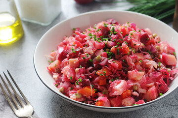 A bowl with Vinegret salad, a typical Russian dish