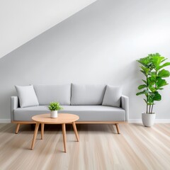 A minimalist living room features a light grey sofa with wooden legs, a small round coffee table, a potted plant, and a light grey wall, showcasing simple elegance and calm Jida89