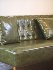 green leather sofa vintage stiyle