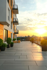 Naklejka premium Modern balcony view at sunset with city skyline in the background