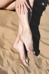 feet on the beach
