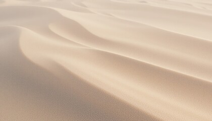 Obraz premium Waves of golden sand shifting across the desert landscape at dusk captured from above in a serene and tranquil environment