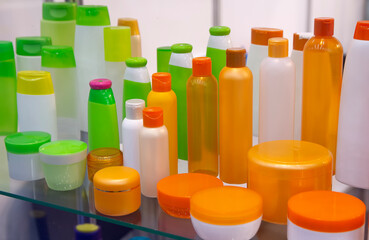 Set of common plastic bottles for household chemistry and cosmetics on a stack