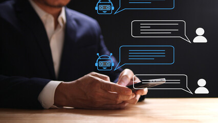 AI Chatbot, Artificial Intelligence, digital chatbot, robot, application, conversation assistant concept. Businessman using mobile smartphone with AI chatbot assistant for customer service support