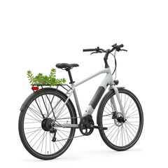 Fototapeta premium Bicycle with small plant growing near wheels on white background